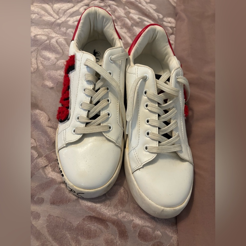 White Sneakers with Red Details